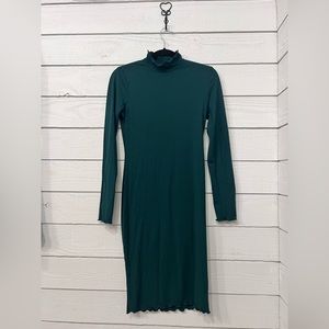 Dark green ribbed bodycon dress made by Heart Hips. Fits like a small.